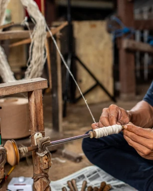 Step 2SpinningAt the coloring stage, we use natural dyes that come from natural ingredients such as spices, herbs and plants. These natural dyes not only provide beautiful and natural colors to products, but also do not cause hazardous waste or pollute the surrounding environment. With every product purchase Kupu Sutera (shoes, bags, scarves, etc.) you don't just get the product which is of high quality and has high aesthetic value, but also contributes to supporting nature conservation, reducing the impact of waste, and encouraging social inclusion for our friends who have disabilities.