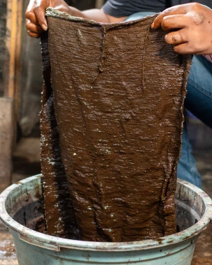 Step 4DyeingAt the coloring stage, we use natural dyes that come from natural ingredients such as spices, herbs and plants. These natural dyes not only provide beautiful and natural colors to products, but also do not cause hazardous waste or pollute the surrounding environment. With every product purchase Kupu Sutera (shoes, bags, scarves, etc.) you don't just get the product which is of high quality and has high aesthetic value, but also contributes to supporting nature conservation, reducing the impact of waste, and encouraging social inclusion for our friends who have disabilities.